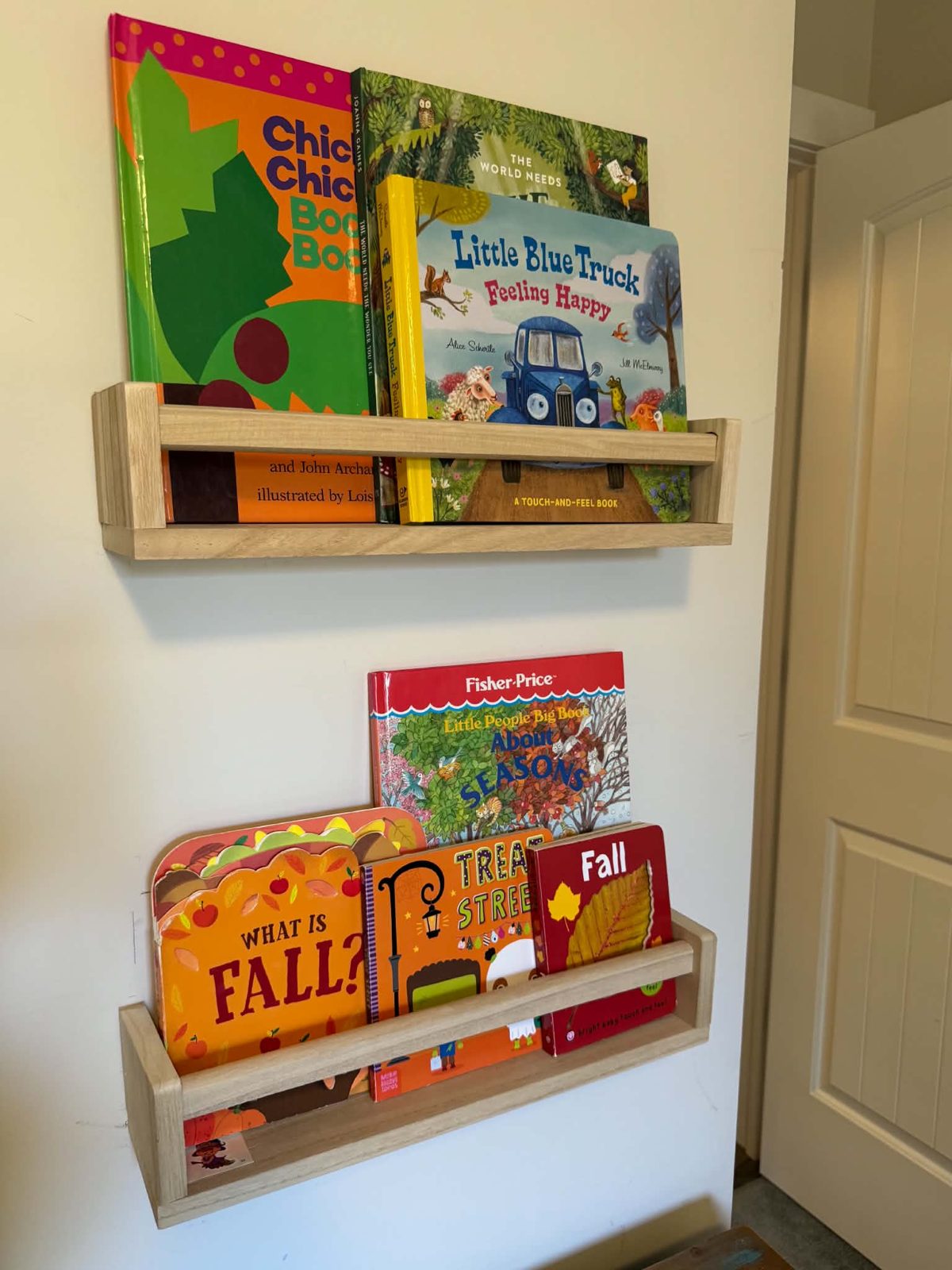 Fall picture books on wall shelves in the classroom