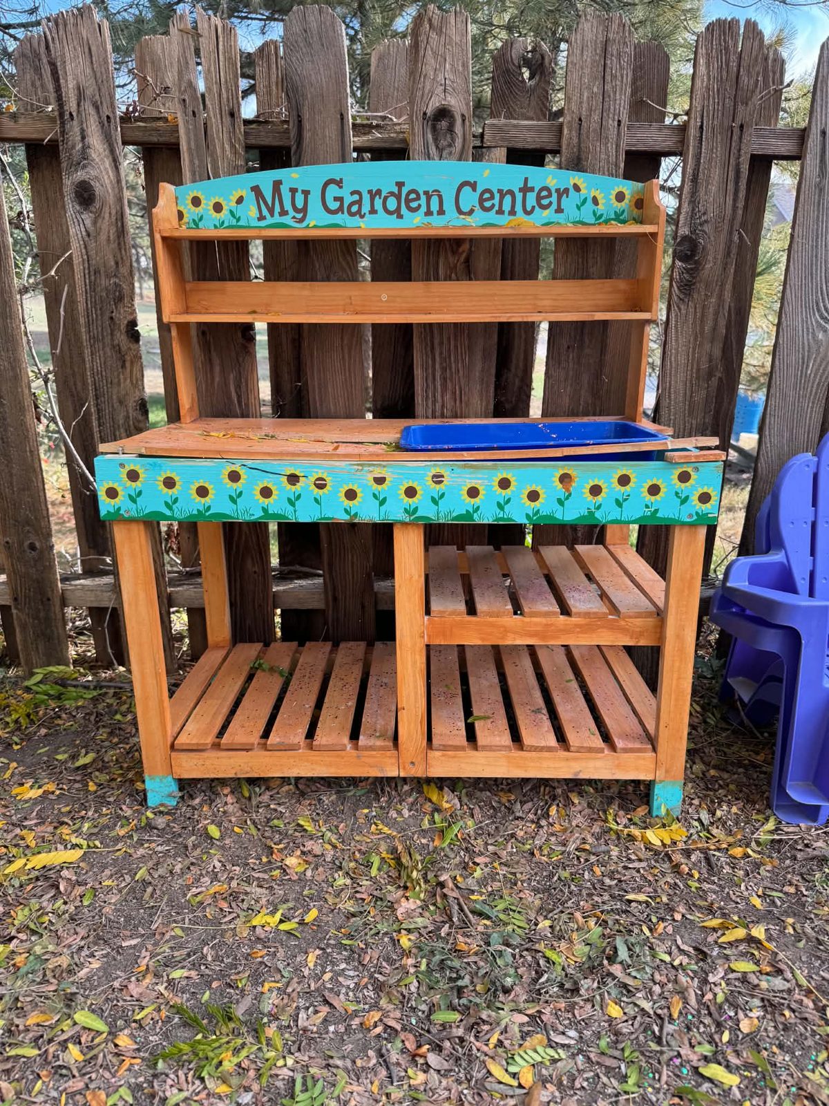 The outdoor play garden center by the fence